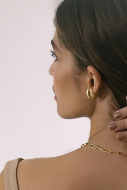 Dipua Brinco Jin Banhado a Ouro - Exuberância e Charme em Cada Detalhe